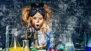 girl scientist amazed